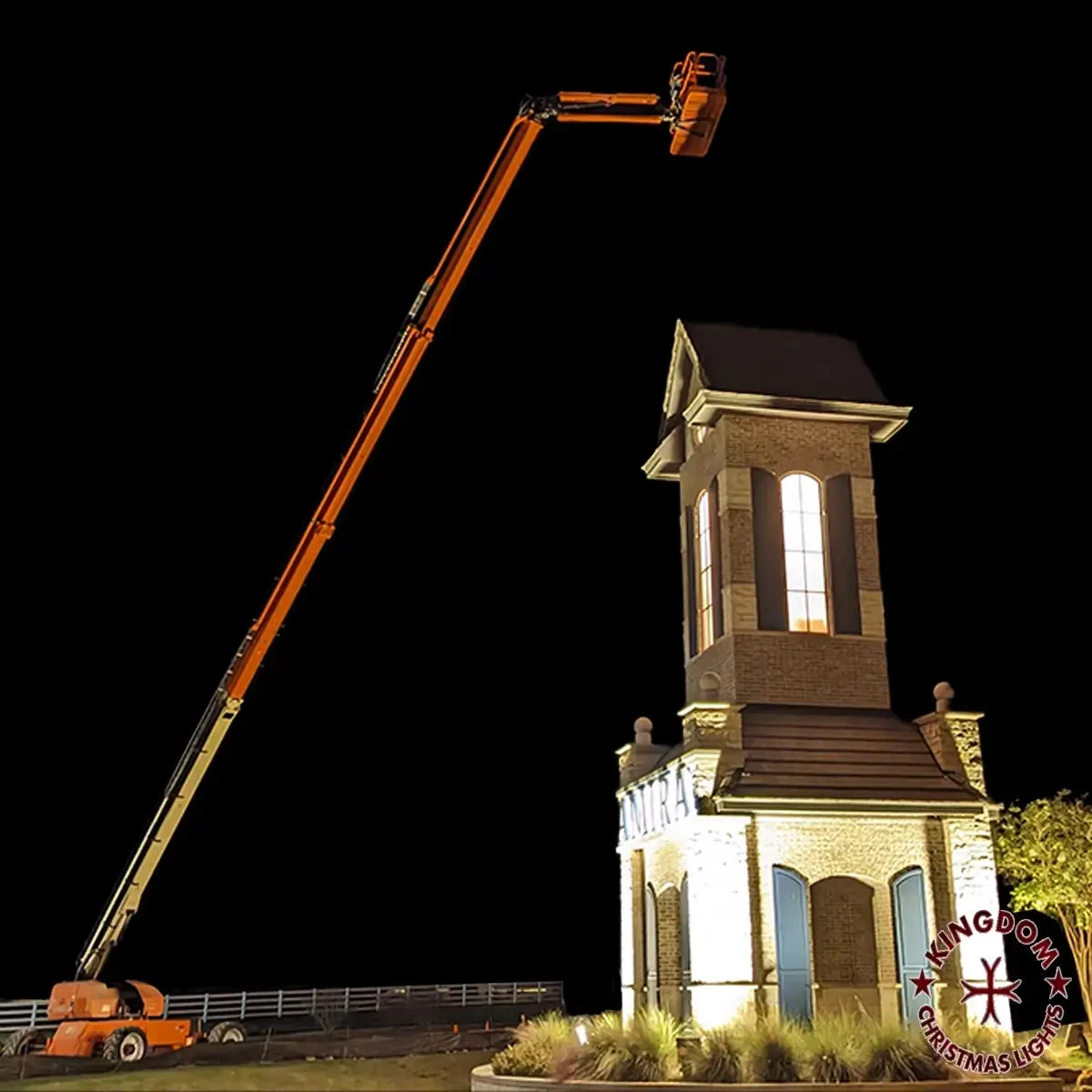 Commercial boom lift used for professional Christmas light installation